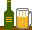 grüne Flasche Bier steht neben einem halb gefüllten Bierhumpen