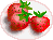 3 Erdbeeren auf einem Teller