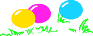 3 Ostereier gelb, pink, blau im Gras liegend