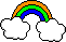 voller Regenbogen orange grün blau zwischen 2 weißen Wolken
