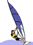 Windsurfer mit gelber Weste auf weißem Board mit blauem Segel